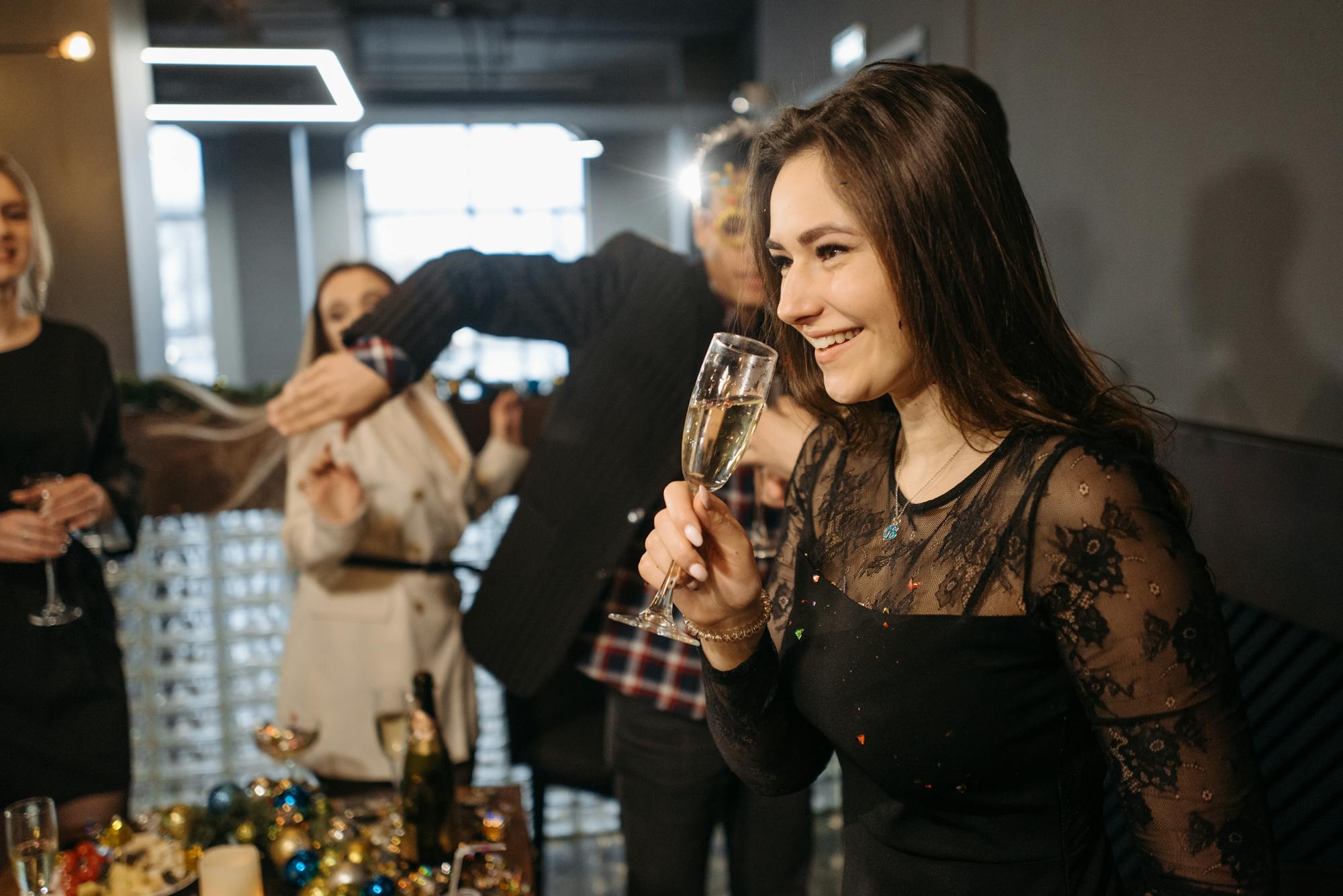 Guest with champagne at a corporate networking event